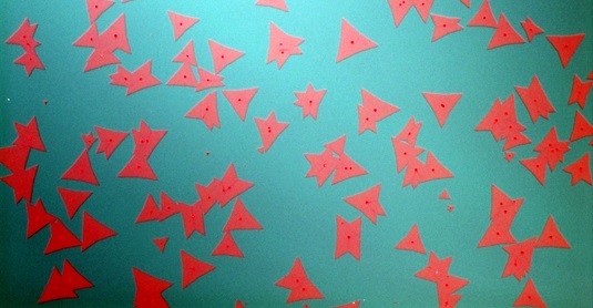 Light micrograph showing two-dimensional crystals of the thin-film semiconductor molybdenum sulfide